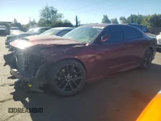 ✅ 2019 Dodge Charger Scat Pack • VIN: 2C3CDXGJ6KH646445 • Лот: 90696995. Опубликован ранее на Copart с пробегом 62 753 миль. Бесплатный доступ к архиву аукционных продаж из США и подробный отчёт об истории автомобиля на DreamBid. Изображение 1.