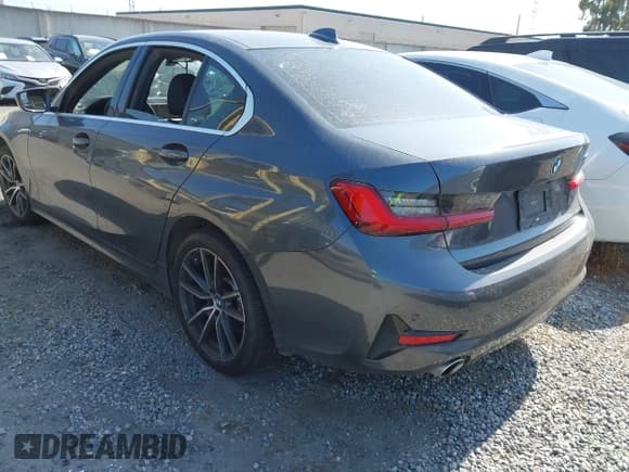 ✅ 2019 BMW 3 Series 330i • VIN: WBA5R1C5XKFH20799 • Lot: 42207910. Listed on IAAI with 59,202 mi. Free auction sales archive from the USA and detailed vehicle history report at DreamBid. Image 3.