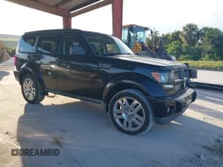 ✅ 2010 Dodge Nitro Heat • VIN: 1D4PU4GK7AW161402 • Lot: 43267347. Listed on IAAI with 166,586 mi. Free auction sales archive from the USA and detailed vehicle history report at DreamBid. Image 1.