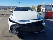 ✅ 2025 Toyota Crown Nightshade • VIN: JTDAAAAF9S3031968 • Lot: 43707887. Listed on IAAI with 9,385 mi. Free auction sales archive from the USA and detailed vehicle history report at DreamBid. Image 6.