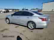 2015 Nissan Altima SV with VIN 1N4AL3AP4FC222434, listed as a Copart auction lot 89572015 with 122,236 mi miles and Salvage title. Bid and sale history available at DreamBid. Image 2.