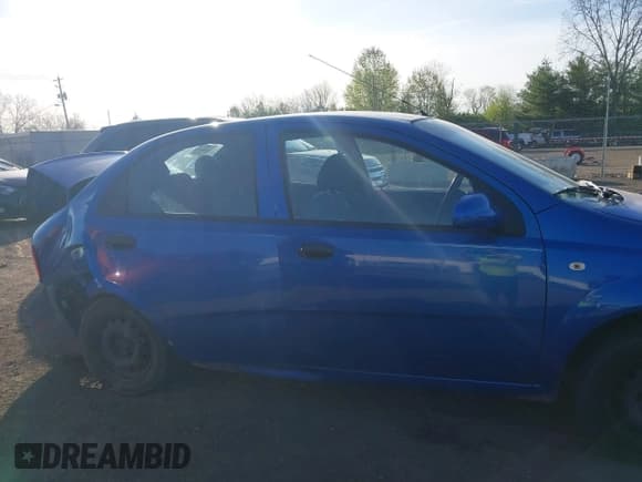 ✅ 2005 Chevrolet Aveo LS • VIN: KL1TD52665B289064 • Lot: 42099766. Listed on IAAI with 114,001 mi. Free auction sales archive from the USA and detailed vehicle history report at DreamBid. Image 13.