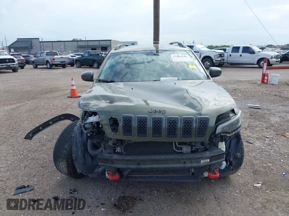 ✅ 2019 Jeep Cherokee Trailhawk • VIN: 1C4PJMBX7KD200334 • Лот: 43383144. Опубликован ранее на IAAI с пробегом 245 711 миль. Бесплатный доступ к архиву аукционных продаж из США и подробный отчёт об истории автомобиля на DreamBid. Изображение 13.