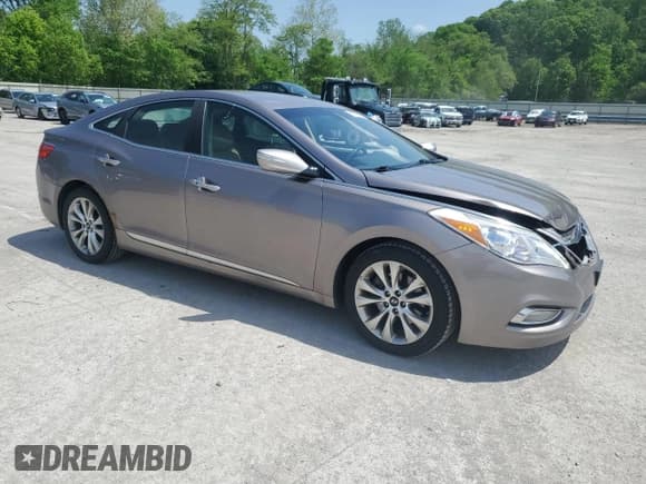 ✅ 2013 Hyundai Azera • VIN: KMHFG4JG4DA240690 • Лот: 57465565. Опубликован ранее на Copart с пробегом 164 757 миль. Бесплатный доступ к архиву аукционных продаж из США и подробный отчёт об истории автомобиля на DreamBid. Изображение 4.