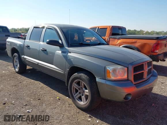 2007 Dodge Dakota SLT with VIN 1D7HW48K17S141534, listed as a IAAI auction lot 43202323 with 187,741 mi miles and . Bid and sale history available at DreamBid. Image 1.