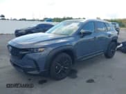 ✅ 2025 Mazda CX-50 S Preferred • VIN: 7MMVABBM1SN392085 • Lot: 43723950. Listed on IAAI with 1,452 mi. Free auction sales archive from the USA and detailed vehicle history report at DreamBid. Image 2.