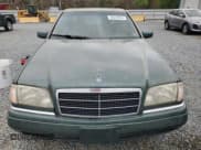 ✅ 1995 Mercedes-Benz C 2.8L • VIN: WDBHA28E3SF241951 • Лот: 50332845. Опубликован ранее на Copart с пробегом 236 068 миль. Бесплатный доступ к архиву аукционных продаж из США и подробный отчёт об истории автомобиля на DreamBid. Изображение 5.