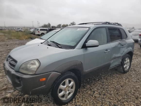 2005 Hyundai Tucson GLS z VIN KM8JN72DX5U214908, wystawiony jako Copart lot #76346024 z przebiegiem 152 677 mil mil oraz Szkoda całkowita • Salvage title. Historia ofert i sprzedaży dostępna na DreamBid. Obrazek 1.