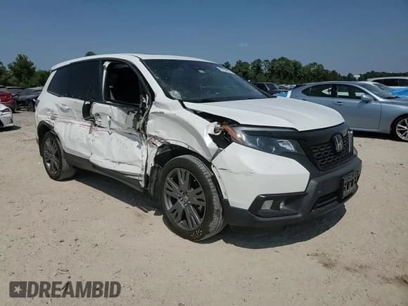✅ 2021 Honda Passport EX-L • VIN: 5FNYF7H55MB004689 • Lot: 80755855. Listed on Copart with 97,016 mi. Free auction sales archive from the USA and detailed vehicle history report at DreamBid. Image 14.