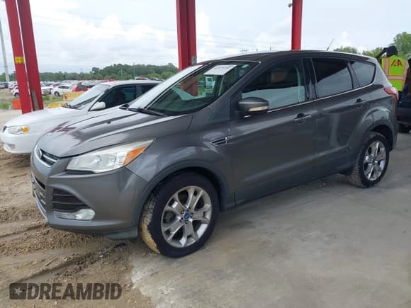 ✅ 2013 Ford Escape SEL • VIN: 1FMCU0HX8DUB61208 • Лот: 42575283. Опубликован ранее на IAAI с пробегом 140 330 миль. Бесплатный доступ к архиву аукционных продаж из США и подробный отчёт об истории автомобиля на DreamBid. Изображение 2.