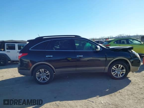 2012 Hyundai Veracruz Limited z VIN KM8NU4CC5CU203966, wystawiony jako IAAI lot #41405622 z przebiegiem 150 938 mil mil oraz . Historia ofert i sprzedaży dostępna na DreamBid. Obrazek 13.