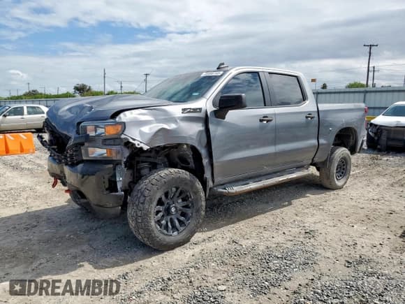 ✅ 2021 Chevrolet Silverado 1500 Custom Trail Boss • VIN: 1GCPYCEF7MZ371129 • Lot: 85895145. Wystawiony na Copart z przebiegiem 122 486 mil. Bezpłatny archiwum sprzedaży aukcyjnych z USA i szczegółowy raport historii pojazdu na DreamBid. Zdjęcie 1.