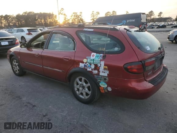 ✅ 2001 Mercury Sable LS Premium • VIN: 1MEHM59S91A635138 • Lot: 84674814. Listed on Copart with 170,559 mi. Free auction sales archive from the USA and detailed vehicle history report at DreamBid. Image 2.