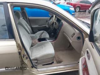 ✅ 2003 Kia Optima LX • VIN: KNAGD128X35244612 • Lot: 43759125. Wystawiony na IAAI z przebiegiem 104 682 mil. Bezpłatny archiwum sprzedaży aukcyjnych z USA i szczegółowy raport historii pojazdu na DreamBid. Zdjęcie 5.