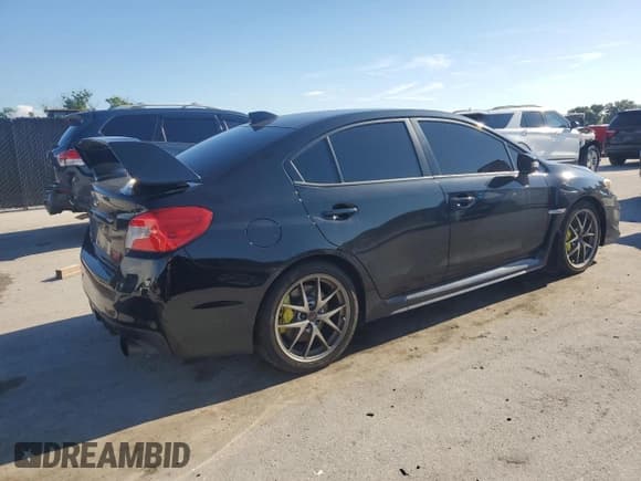 ✅ 2020 Subaru WRX STI • VIN: JF1VA2E61L9804518 • Lot: 69871235. Listed on Copart with 93,292 mi. Free auction sales archive from the USA and detailed vehicle history report at DreamBid. Image 3.