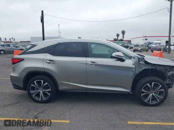 ✅ 2021 Lexus RX 450h • VIN: 2T2HGMDA3MC060208 • Лот: 42163455. Опубликован ранее на IAAI с пробегом 34 167 миль. Бесплатный доступ к архиву аукционных продаж из США и подробный отчёт об истории автомобиля на DreamBid. Изображение 14.