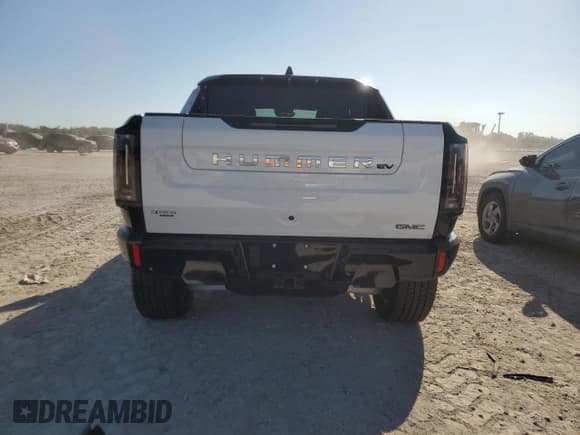 ✅ 2025 GMC HUMMER EV • VIN: 1GT10DDB1SU103382 • Lot: 44703735. Wystawiony na Copart z przebiegiem 28 mil. Bezpłatny archiwum sprzedaży aukcyjnych z USA i szczegółowy raport historii pojazdu na DreamBid. Zdjęcie 6.