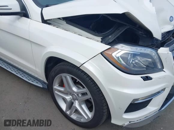 ✅ 2015 Mercedes-Benz GL 550 • VIN: 4JGDF7DE8FA464005 • Lot: 42844382. Listed on IAAI with 118,988 mi. Free auction sales archive from the USA and detailed vehicle history report at DreamBid. Image 17.