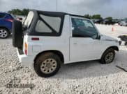 ✅ 1994 Suzuki Sidekick • VIN: 2S3TA01C8R6408593 • Lot: 65011514. Listed on Copart with 248,814 mi. Free auction sales archive from the USA and detailed vehicle history report at DreamBid. Image 3.
