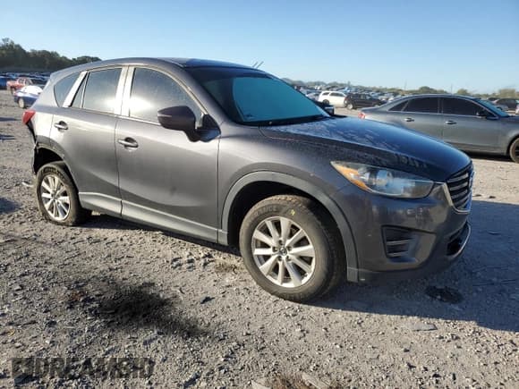 ✅ 2016 Mazda CX-5 Sport • VIN: JM3KE4BY5G0799523 • Lot: 84644205. Listed on Copart with 149,112 mi. Free auction sales archive from the USA and detailed vehicle history report at DreamBid. Image 4.