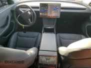 ✅ 2024 Tesla Model 3 • VIN: 5YJ3E1EA9RF835597 • Lot: 79460024. Wystawiony na Copart z przebiegiem 1 479 mil. Bezpłatny archiwum sprzedaży aukcyjnych z USA i szczegółowy raport historii pojazdu na DreamBid. Zdjęcie 8.