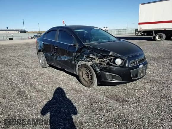 2012 Chevrolet Sonic LT с VIN 1G1JC5EHXC4204379, выставлен на аукционе Copart как лот 90040615 с пробегом 186 920 миль миль и Списание • Salvage title. История ставок и продаж доступна на DreamBid. Изображение 14.