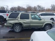 ✅ 2001 Infiniti QX4 Luxury • VIN: JNRDR09Y91W216718 • Lot: 41593596. Listed on IAAI with 231,749 mi. Free auction sales archive from the USA and detailed vehicle history report at DreamBid. Image 13.