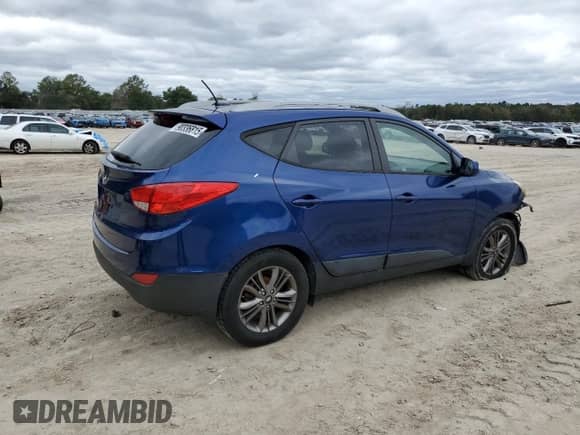 2014 Hyundai Tucson Limited with VIN KM8JU3AGXEU799903, listed as a Copart auction lot 90336815 with 82,303 mi miles and Salvage title. Bid and sale history available at DreamBid. Image 3.
