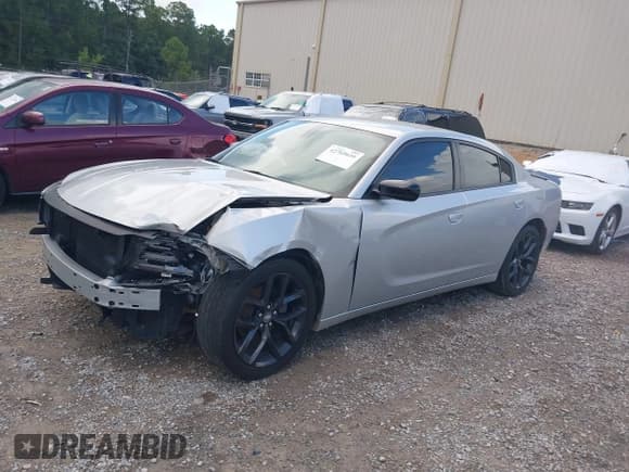 ✅ 2020 Dodge Charger SXT • VIN: 2C3CDXBG6LH102556 • Lot: 42769039. Listed on IAAI with 56,394 mi. Free auction sales archive from the USA and detailed vehicle history report at DreamBid. Image 19.