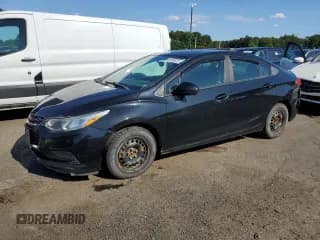 ✅ 2016 Chevrolet Cruze LS • VIN: 1G1BB5SM7G7283846 • Lot: 63503325. Listed on Copart with 139,101 mi. Free auction sales archive from the USA and detailed vehicle history report at DreamBid. Image 1.