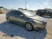 ✅ 2018 Ford Focus SE • VIN: 1FADP3FE7JL229461 • Lot: 82499245. Wystawiony na Copart z przebiegiem 66 300 mil. Bezpłatny archiwum sprzedaży aukcyjnych z USA i szczegółowy raport historii pojazdu na DreamBid. Zdjęcie 13.