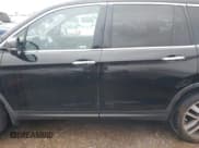 ✅ 2018 Honda Pilot Touring • VIN: 5FNYF5H99JB017044 • Lot: 43821143. Listed on IAAI with 156,739 mi. Free auction sales archive from the USA and detailed vehicle history report at DreamBid. Image 14.