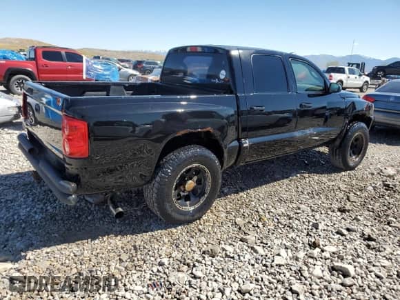 2005 Dodge Dakota ST with VIN 1D7HW28K55S259104, listed as a Copart auction lot 55859185 with 143,004 mi miles and Salvage title. Bid and sale history available at DreamBid. Image 3.