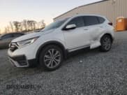 ✅ 2021 Honda CR-V Touring • VIN: 5J6RW2H93ML000075 • Lot: 92000335. Wystawiony na Copart z przebiegiem 82 475 mil. Bezpłatny archiwum sprzedaży aukcyjnych z USA i szczegółowy raport historii pojazdu na DreamBid. Zdjęcie 1.