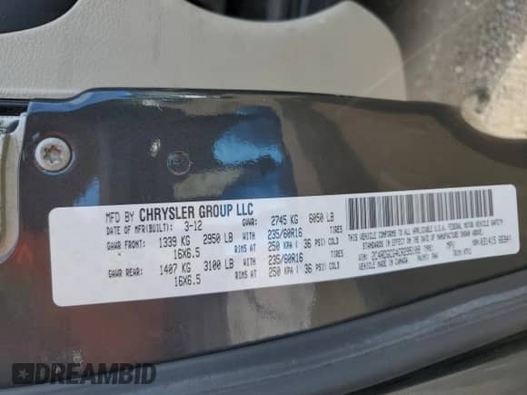 2012 Dodge Grand Caravan SXT z VIN 2C4RDGCG4CR295109, wystawiony jako Copart lot #61629604 z przebiegiem 80 255 mil mil oraz Czysty tytuł • Clean title. Historia ofert i sprzedaży dostępna na DreamBid. Obrazek 13.