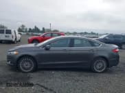 ✅ 2016 Ford Fusion Titanium • VIN: 3FA6P0K91GR248968 • Лот: 43181413. Опубликован ранее на IAAI с пробегом 126 692 миль. Бесплатный доступ к архиву аукционных продаж из США и подробный отчёт об истории автомобиля на DreamBid. Изображение 14.