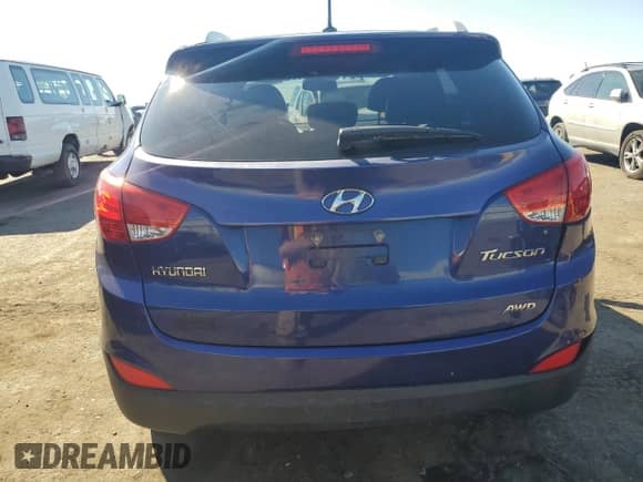 2011 Hyundai Tucson Limited with VIN KM8JUCAC3BU244297, listed as a Copart auction lot 48629585 with 208,270 mi miles and Salvage title. Bid and sale history available at DreamBid. Image 6.