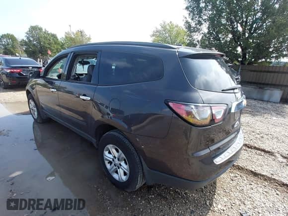 2013 Chevrolet Traverse LS with VIN 1GNKRFED9DJ142240, listed as a IAAI auction lot 43289842 with 152,647 mi miles and . Bid and sale history available at DreamBid. Image 3.