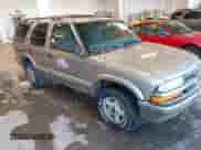 2001 Chevrolet Blazer LT z VIN 1GNDT13WX12201416, wystawiony jako IAAI lot #41307116 z przebiegiem 244 058 mil mil oraz . Historia ofert i sprzedaży dostępna na DreamBid. Obrazek 1.