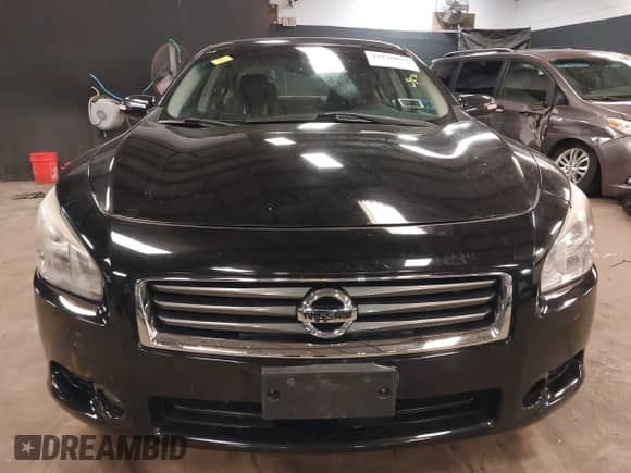 2012 Nissan Maxima S z VIN 1N4AA5AP9CC863172, wystawiony jako IAAI lot #42120073 z przebiegiem 102 500 mil mil oraz . Historia ofert i sprzedaży dostępna na DreamBid. Obrazek 12.