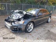 ✅ 2019 Audi A5 Premium Plus • VIN: WAUTNAF57KA051562 • Лот: 43611331. Опубликован ранее на IAAI с пробегом 58 324 миль. Бесплатный доступ к архиву аукционных продаж из США и подробный отчёт об истории автомобиля на DreamBid. Изображение 18.