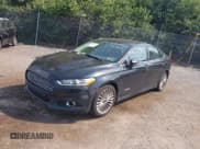 ✅ 2014 Ford Fusion Titanium Hybrid • VIN: 3FA6P0RUXER191158 • Lot: 42815287. Wystawiony na IAAI z przebiegiem 162 415 mil. Bezpłatny archiwum sprzedaży aukcyjnych z USA i szczegółowy raport historii pojazdu na DreamBid. Zdjęcie 2.