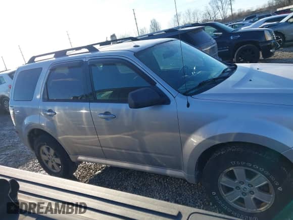 2010 Mercury Mariner z VIN 4M2CN8B73AKJ15604, wystawiony jako IAAI lot #41454647 z przebiegiem 170 761 mil mil oraz . Historia ofert i sprzedaży dostępna na DreamBid. Obrazek 13.