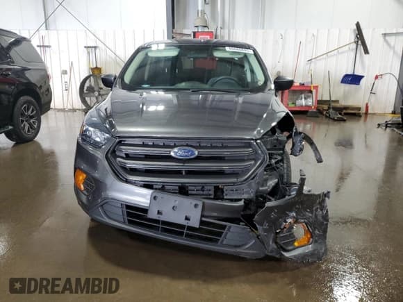 ✅ 2018 Ford Escape S • VIN: 1FMCU0F74JUC76340 • Lot: 86680845. Listed on Copart with 92,128 mi. Free auction sales archive from the USA and detailed vehicle history report at DreamBid. Image 5.