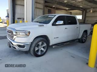 2020 Ram 1500 Laramie с VIN 1C6SRFJT8LN355037, выставлен на аукционе Copart как лот 83815665 с пробегом Не указан миль и Списание • Salvage title. История ставок и продаж доступна на DreamBid. Изображение 1.
