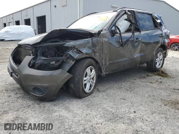 2012 Hyundai Santa Fe GLS с VIN 5XYZG3AB7CG145877, выставлен на аукционе Copart как лот 71986394 с пробегом Не указан миль и На запчасти • Non repairable. История ставок и продаж доступна на DreamBid. Изображение 1.