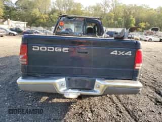 2000 Dodge Dakota Sport z VIN 1B7GG22N2YS659373, wystawiony jako Copart lot #75728094 z przebiegiem Nie podano mil oraz Szkoda całkowita • Salvage title. Historia ofert i sprzedaży dostępna na DreamBid. Obrazek 6.