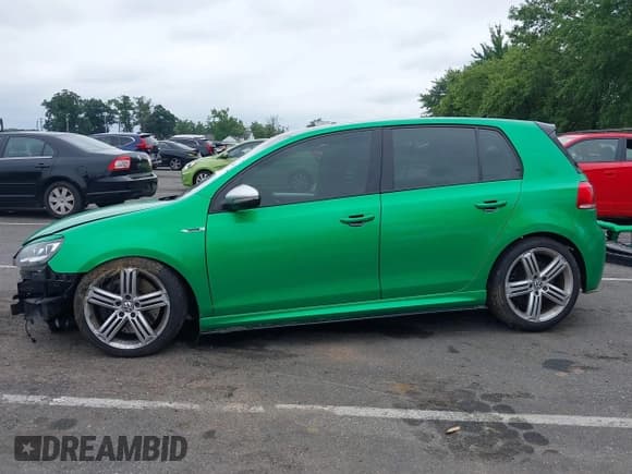 ✅ 2013 Volkswagen Golf R w/Sunroof & Navi • VIN: WVWPF7AJ5DW118125 • Лот: 42870441. Опубликован ранее на IAAI с пробегом 124 238 миль. Бесплатный доступ к архиву аукционных продаж из США и подробный отчёт об истории автомобиля на DreamBid. Изображение 14.