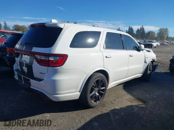 2018 Dodge Durango SRT with VIN 1C4SDJGJ3JC395759, listed as a IAAI auction lot 41689356 with 83,577 mi miles and . Bid and sale history available at DreamBid. Image 4.