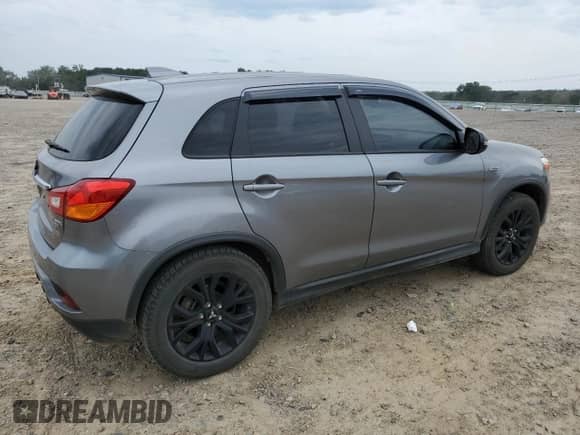 2019 Mitsubishi Outlander ES z VIN JA4AP3AU9KU009997, wystawiony jako Copart lot #71856775 z przebiegiem 97 756 mil mil oraz Szkoda całkowita • Salvage title. Historia ofert i sprzedaży dostępna na DreamBid. Obrazek 3.